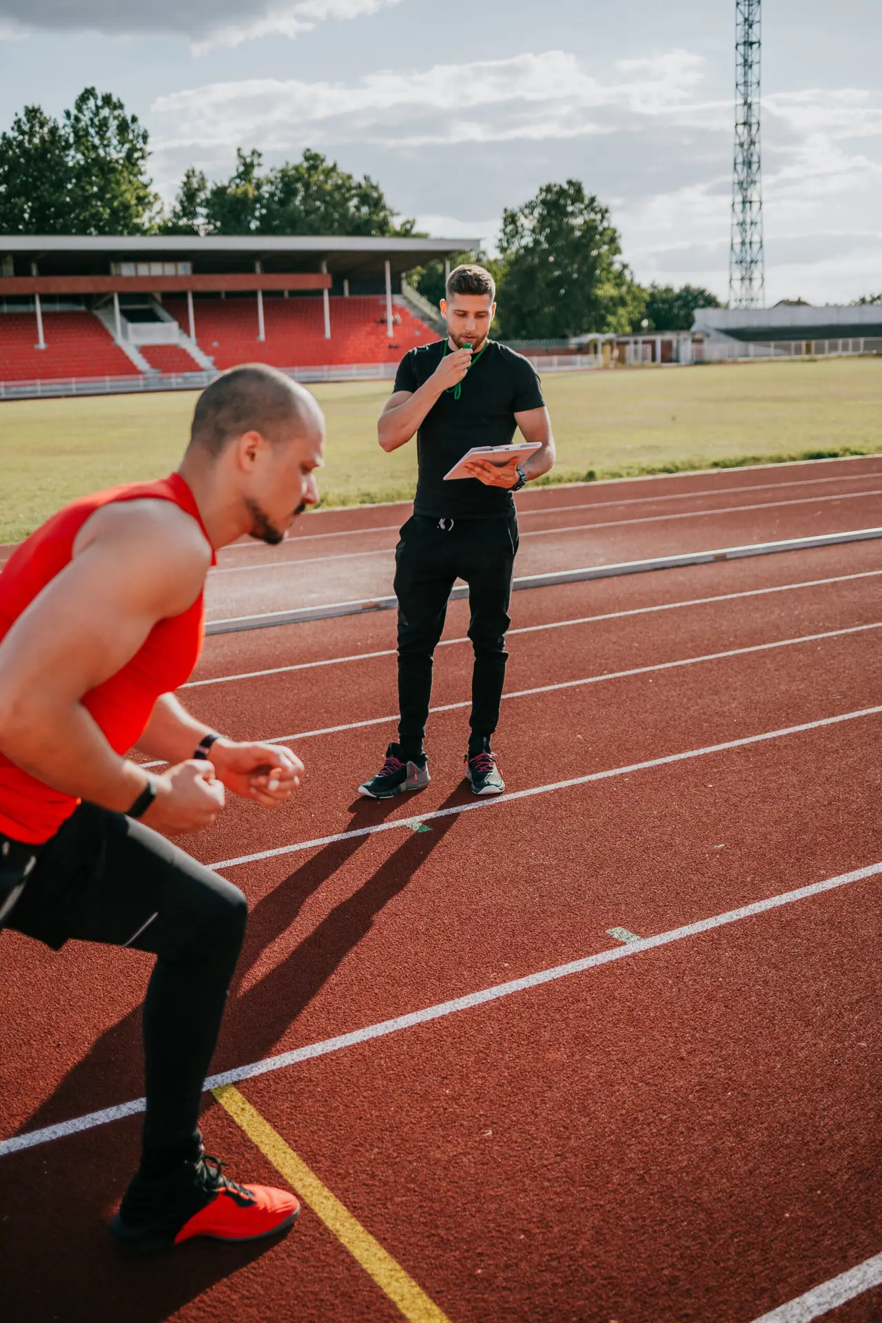 Toronto running coach training client on how to sprint properly